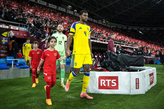 Goalkeeper Viktor Johansson and Isak Hien of Sweden