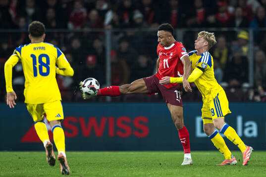 Yasin Ayari and Daniel Svensson of Sweden against Dan Ndoye