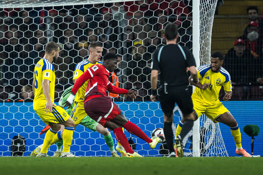 Breel Embolo of Switzerland scores the 1-0