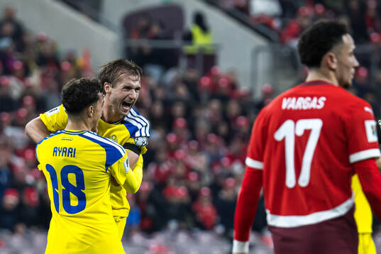 Yasin Ayari and Benjamin Nygren of Sweden celebrate the 1-1