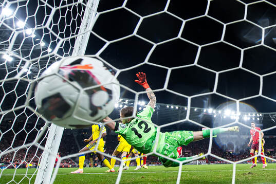 Breel Embolo of Switzerland scores the 1-0 goal behind