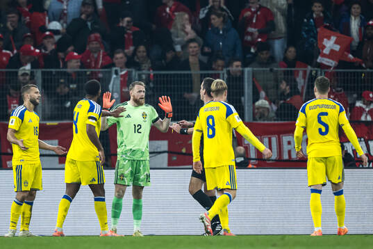 Goalkeeper Viktor Johansson of Sweden reacts