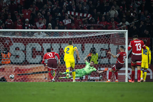 Granit Xhaka of Switzerland scores the 2-1 goal behind