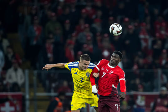 Gustaf Lagerbielke of Sweden and Breel Embolo of Switzerland