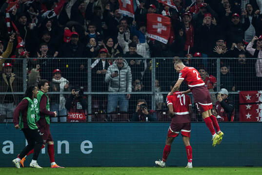Dan Ndoye and Miro Muheim of Switzerland celebrate the 3-1