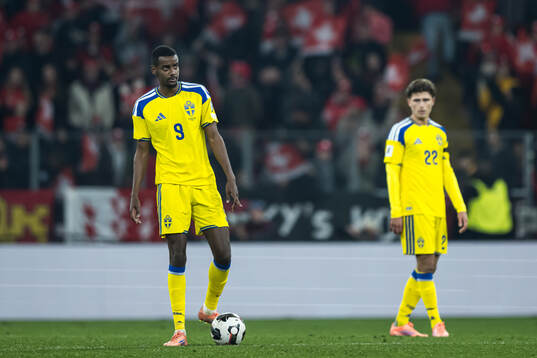 Alexander Isak and Besfort Zeneli of Sweden look dejected
