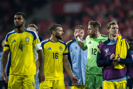 Jesper Karlström and Goalkeeper Viktor Johansson of Sweden