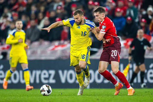 Jesper Karlström of Sweden and Michel Aebischer of