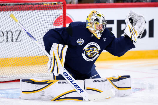 goaltender Justus Annunen at a practice session with