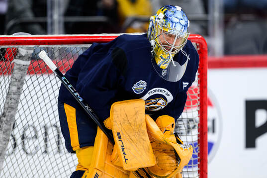 goaltender Justus Annunen at a practice session with