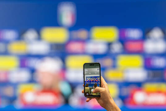 A journalist takes a picture of Erling Braut Haaland of the