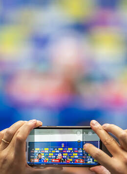 A journalist takes a picture of Erling Braut Haaland of the