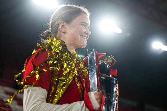 Signe Gaupset of Brann celebrates with the trophy