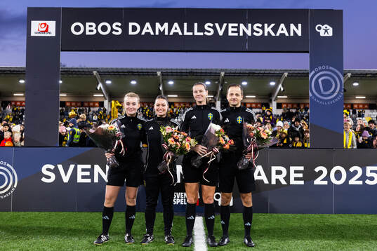 Domare Lovisa Johansson samt assisterande domare Nike