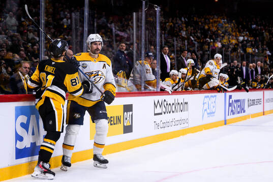 Ben Kindel of Pittsburgh Penguins and Filip Forsberg of