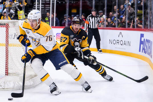 Brady Skjei of Nashville Predators and Sidney Crosby of