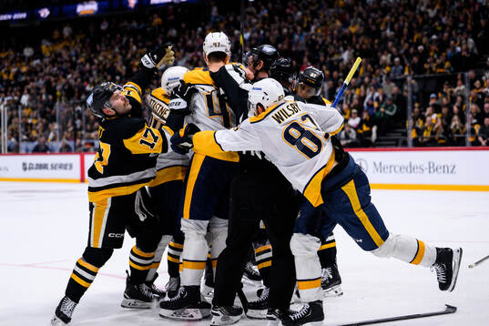 Bryan Rust of Pittsburgh Penguins and Adam Wilsby of