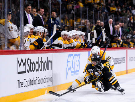Connor Dewar of Pittsburgh Penguins and Ryan O'Reilly of