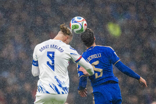 Erling Braut Haaland of Norway and Manuel Locatelli of Italy