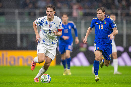 Sander Berge of Norway and Nicolo Barella of Italy