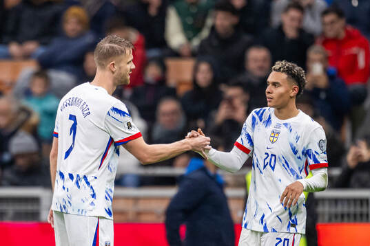 Kristoffer Ajer and Antonio Nusa of Norway celebrate