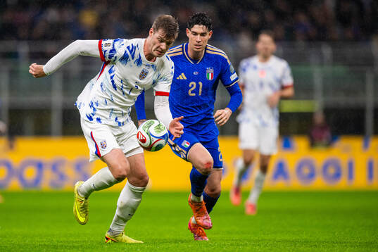 Alexander Sørloth of Norway and Alessandro Bastoni of Italy