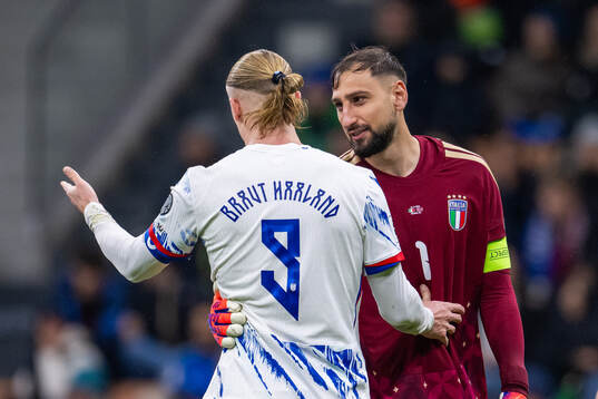 Erling Braut Haaland of Norway and goalkeeper Gianluigi
