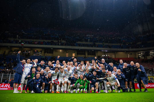 Players and staff of Norway celebrate
