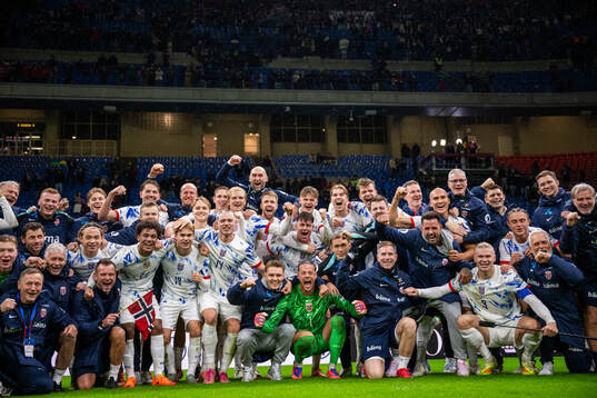 Players and staff of Norway celebrate
