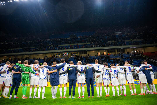 Players and staff of Norway celebrate