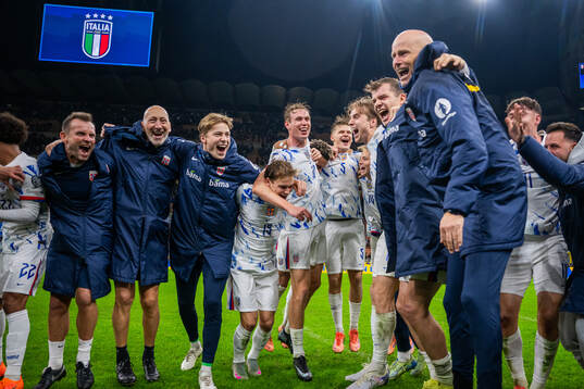 Players and staff of Norway celebrate