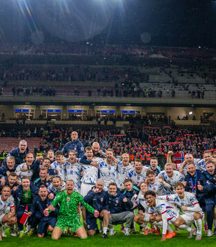 Players and staff of Norway celebrate