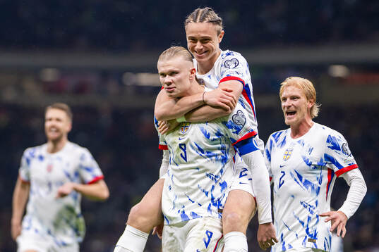 Erling Braut Haaland of Norway celebrates with teammates