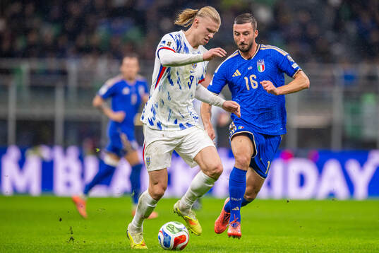 Erling Braut Haaland of Norway and Bryan Cristante of Italy