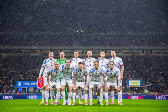 The starting eleven of Norway pose for a team photo