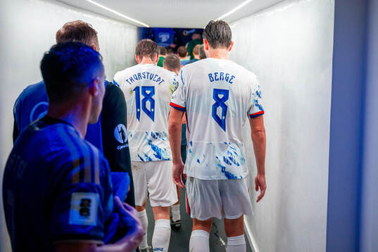 Kristian Thorstvedt and Sander Berge of Norway at half-time