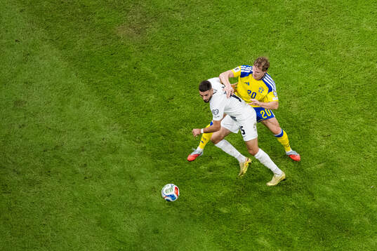 Danijel Sturm of Slovenia and Emil Krafth of Sweden