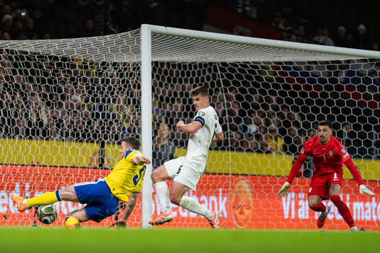 Gabriel Gudmundsson of Sweden against Jaka Bijol and
