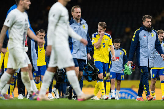 Carl Starfelt of Sweden looks dejected