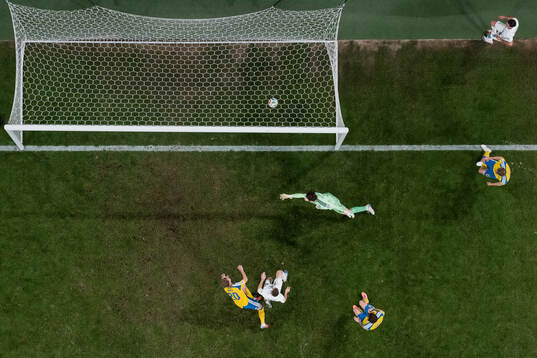 Timi Elsnik of Slovenia scores the 0-1 goal behind