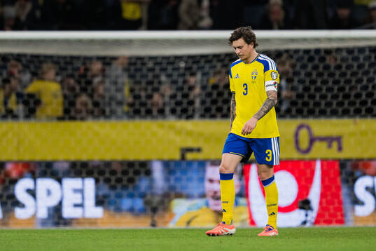 Victor Nilsson Lindelöf of Sweden looks dejected