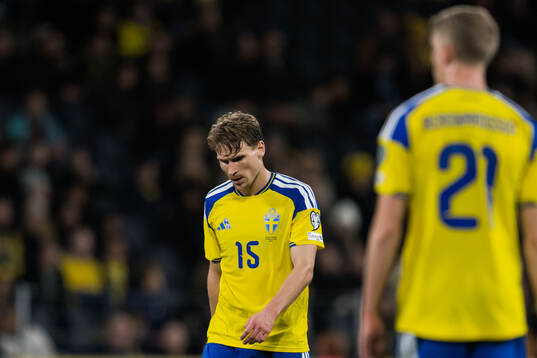 Carl Starfelt of Sweden looks dejected