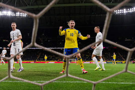 Emil Forsberg of Sweden celebrates as Gustav Lundgren (not