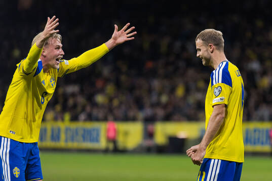 Gustav Lundgren of Sweden celebrates with Herman Johansson