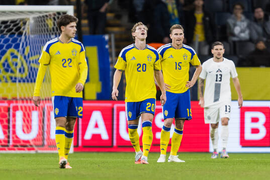 Emil Krafth and Carl Starfelt of Sweden looks dejected