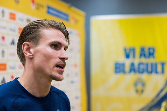 Carl Starfelt of Sweden in mixed zone