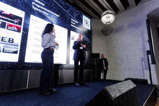 Giselle Abbas, moderator, Ulf Rohlén, styrelseordförande