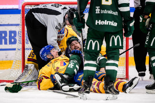 Djurgårdens Jacob Josefson och Färjestads Linus Johansson
