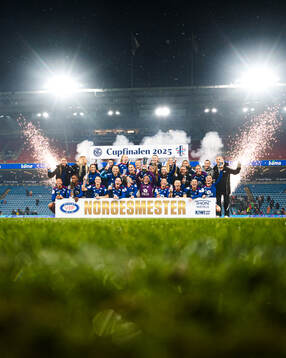Players of Vålerenga celebrates with the trophy