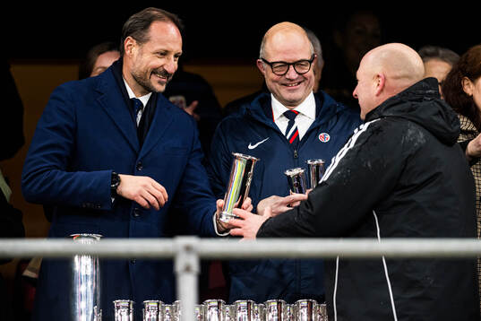 H.M. Crown Prince Haakon of Norway and Head coach Nils